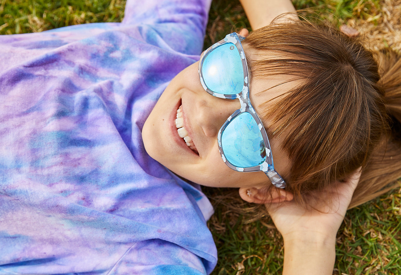 Sunglasses with Head in the Clouds Frames and Polarized Aqua Lenses, Model