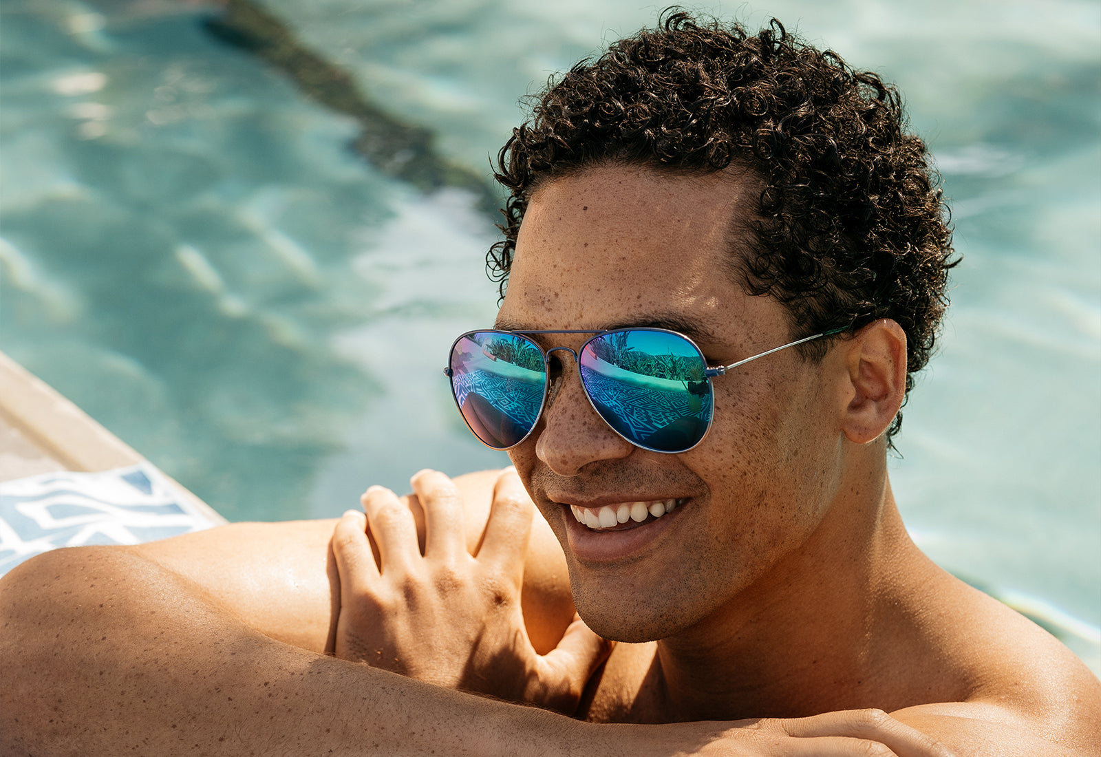 Sunglasses with Blue Metal Frames and Polarized Green Lenses, Model