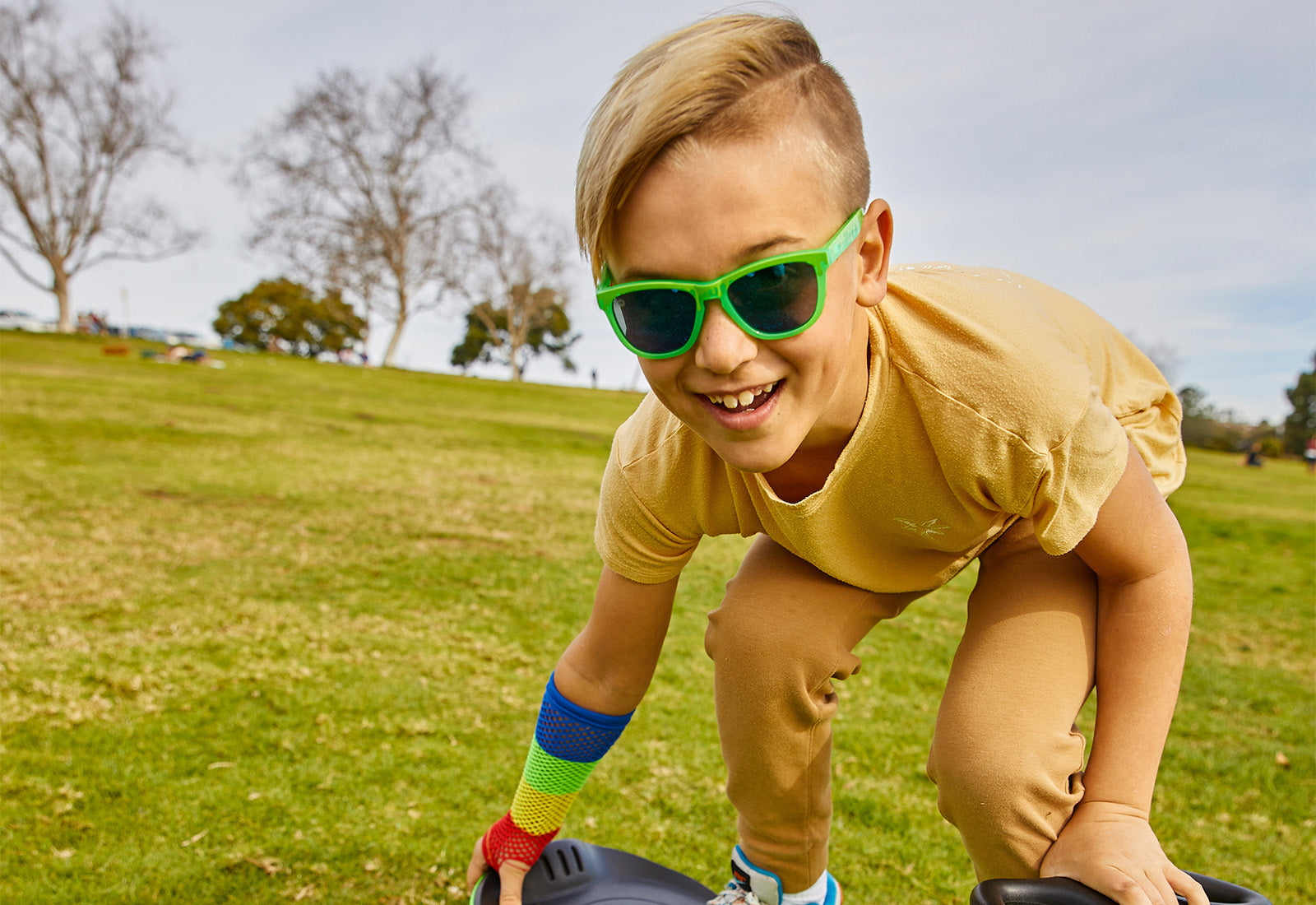 A boy kid wearing sunglasses